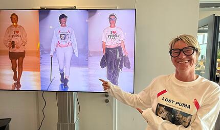 Puma In der Puma-Kantine in Herzogenaurach können alle Mitarbeiter Simone Hoyer bei ihrem großen Auftritt bewundern: Die Puma-Managerin präsentierte bei der Fashion Week in Paris die Kollektion des Labels Doublet.